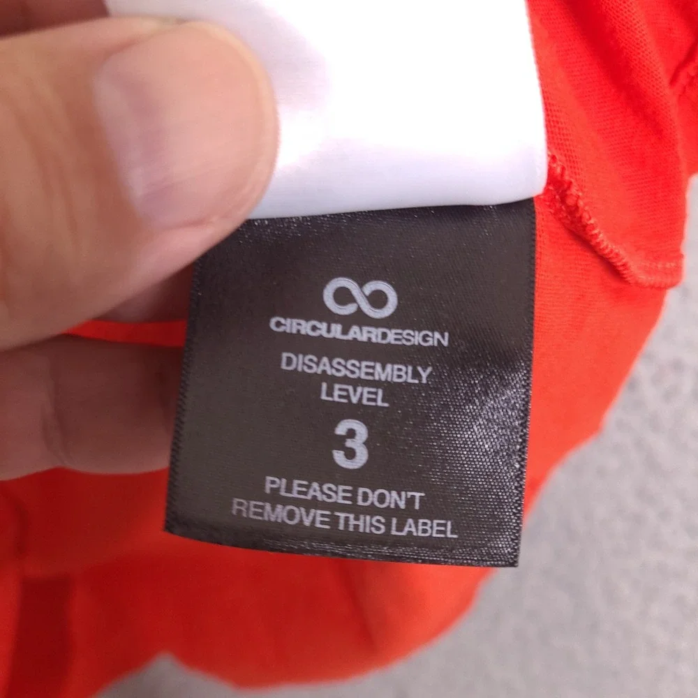 The North Face T-Shirt Mens Small Orange Circular Design Long Sleeve Graphic‎